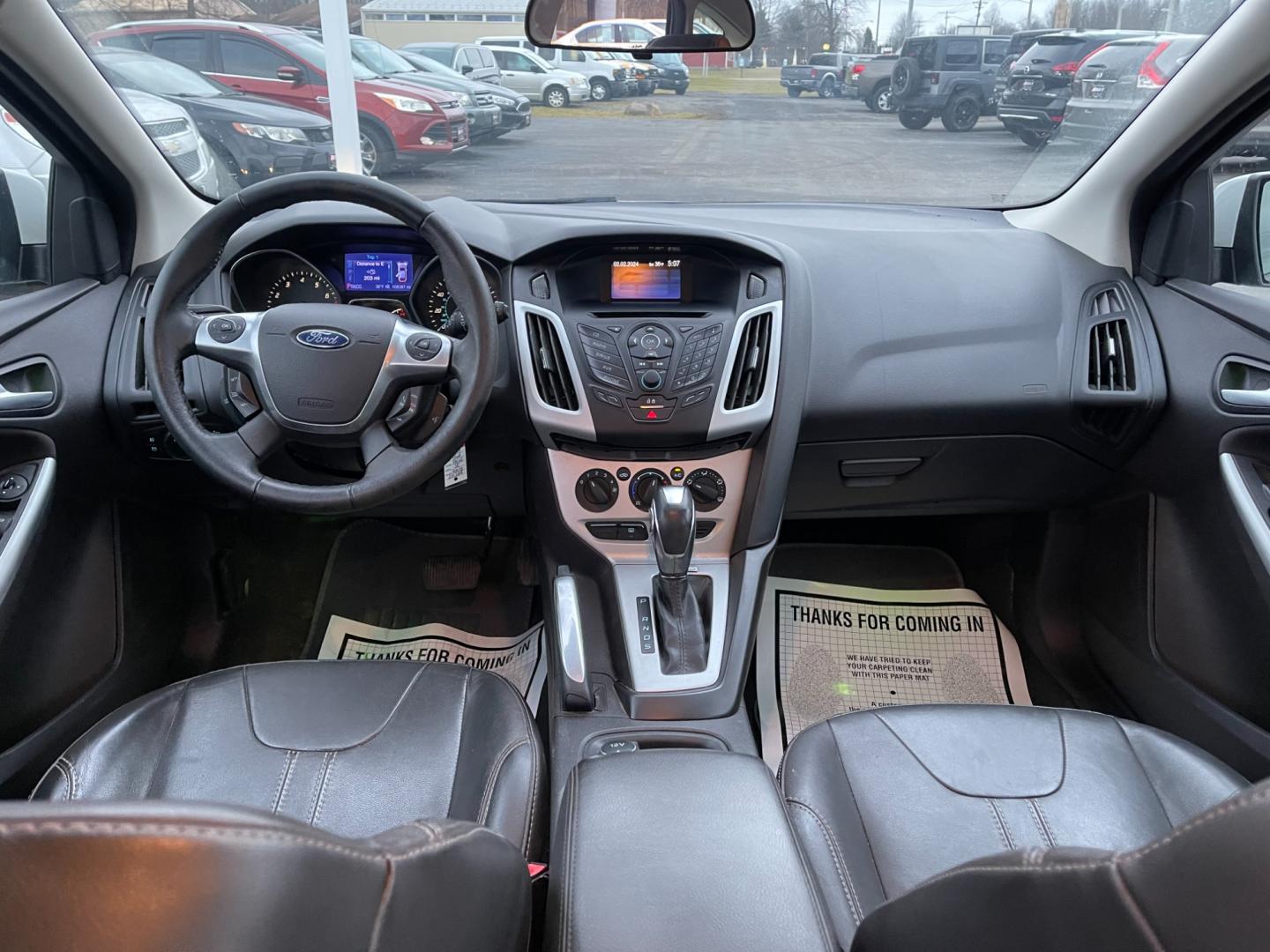 2013 White /Black Ford Focus SE Hatch (1FADP3K29DL) with an 2.0L I4 DOHC 16V engine, 6 Speed Automatic transmission, located at 547 E. Main St., Orwell, OH, 44076, (440) 437-5893, 41.535435, -80.847855 - Photo#34